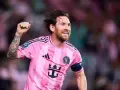 Piłkarz Lionel Messi w różowej koszulce Interu Miami, z podniesioną pięścią. Ile lat ma Messi? Wciąż w formie!