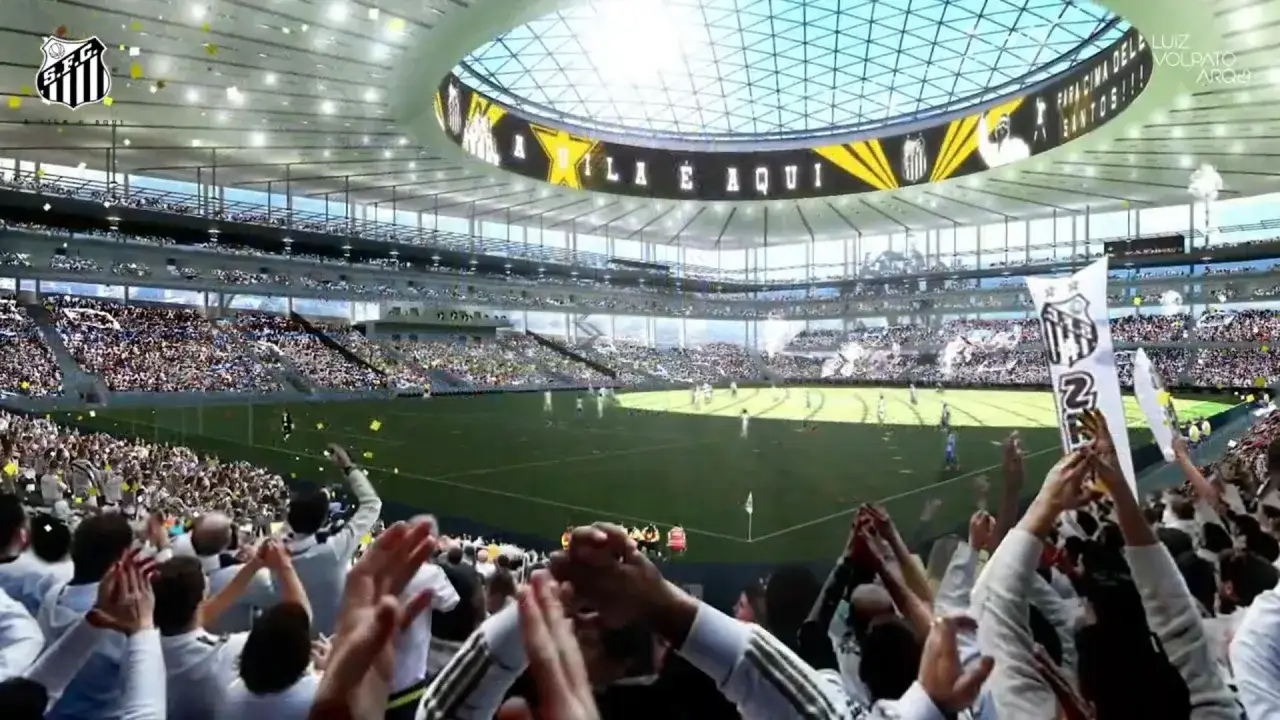 Stadion Santos FC podczas rozgrywek. Tłum kibiców na trybunach, boisko i nowoczesny dach.